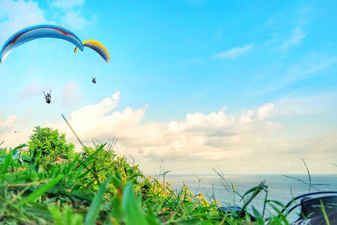 30 minutes tandem Paragliding tours in Bali with free photo/video - Thirty minutes over cliffs and secluded beaches