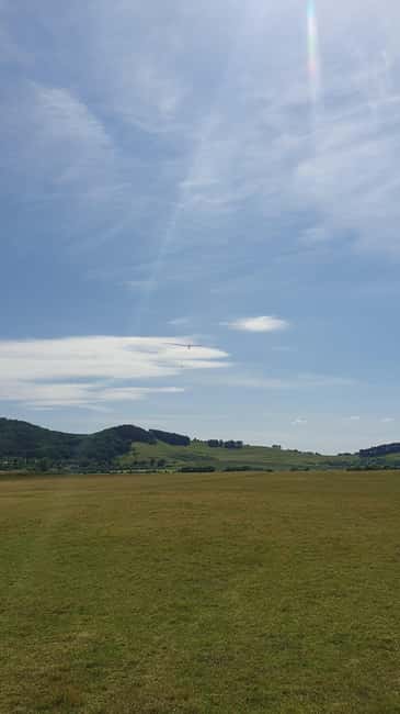 Brasov: Glider Flight Experience at Sanpetru Airfield - The tow launch and first view of Brasov