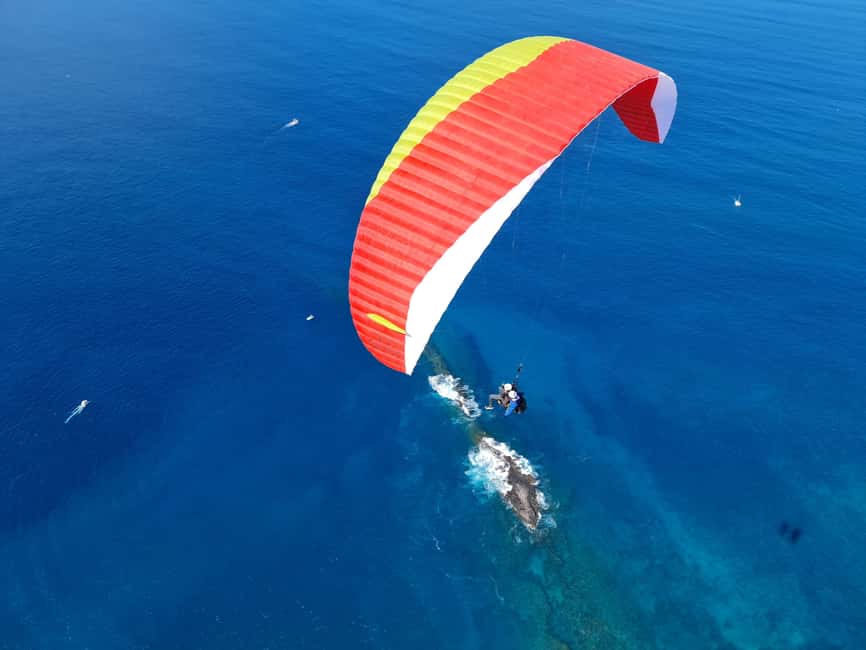 Costa Adeje, Paragliding with pick up service and 5 free photos! - Languages, cancellation, and practical planning