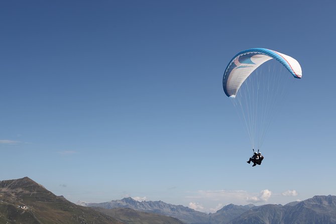 Davos Paragliding Private Tandem Pilot Half Day - A quiet flight over Davos, not a theme-park thrill ride