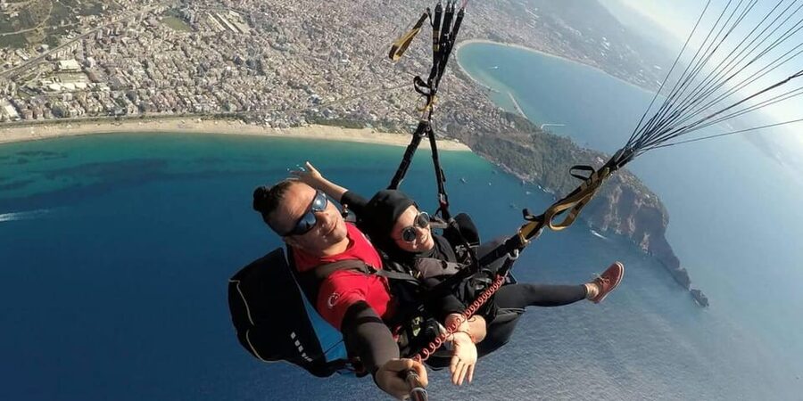 From Antalya/Alanya/Side: Paragliding Adventure - Cleopatra Beach makes a memorable finish