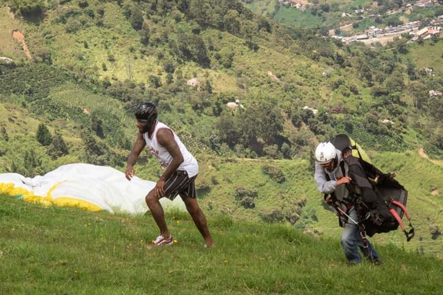 From Medellín: Paragliding Tour with GoPro Photos & Videos - Takeoff and 15 minutes above Medellín
