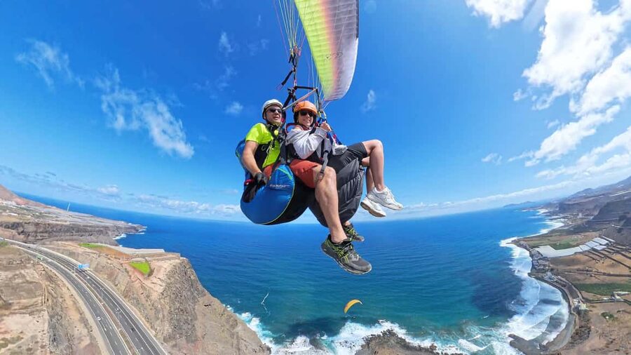 Gran Canaria: Paragliding Flight with Tapas & Pickup - Meeting the white Falcon Wings van