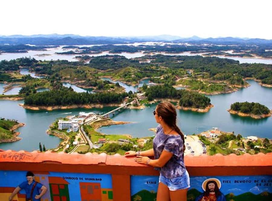 Medellín: Private Tour to Guatapé + Paragliding - Climbing the 740 stairs at El Peñol Rock