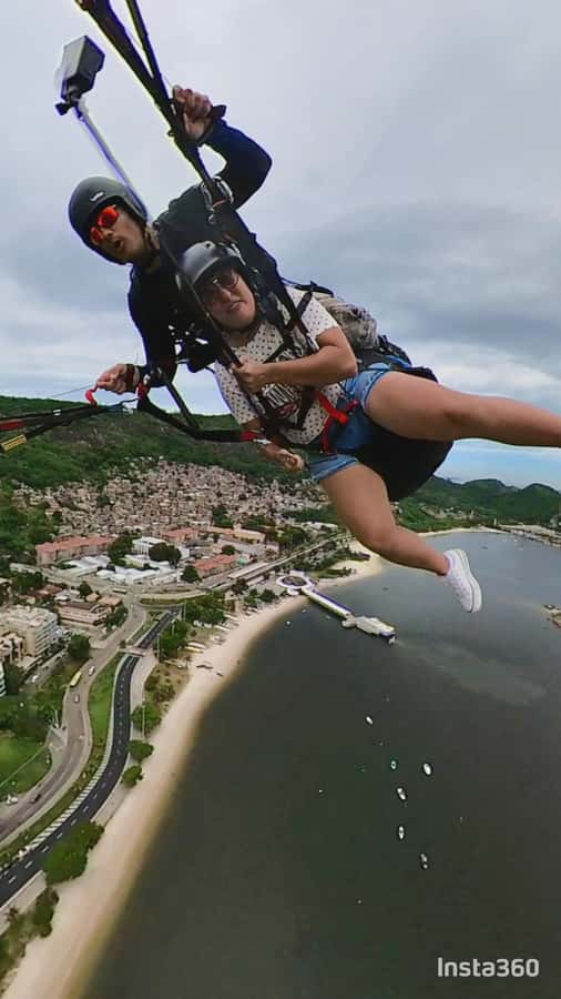Niterói: Paragliding Experience with GoPro Photos and Video - Flying above Niterói with Rio in view