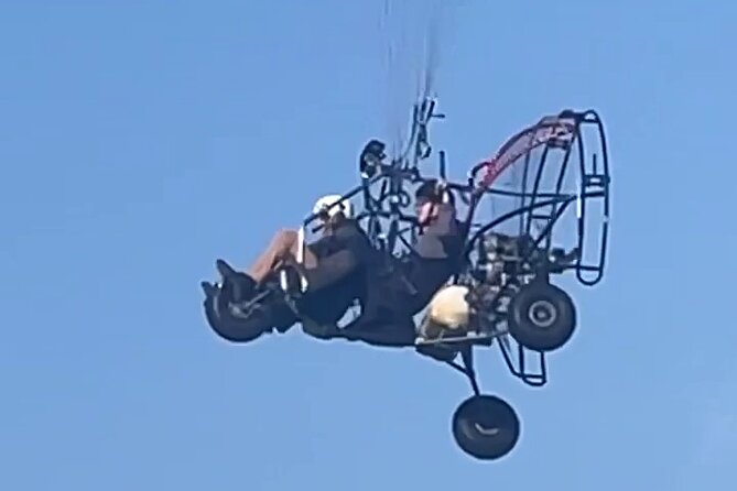 Paraglider flight with a certified instructor - Watching for birds and wildlife