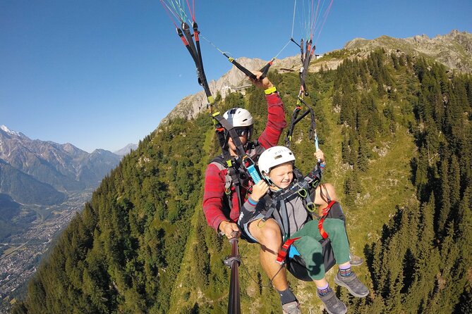 Paragliding Tandem Flight over the Alps in Chamonix - Having a turn at the controls