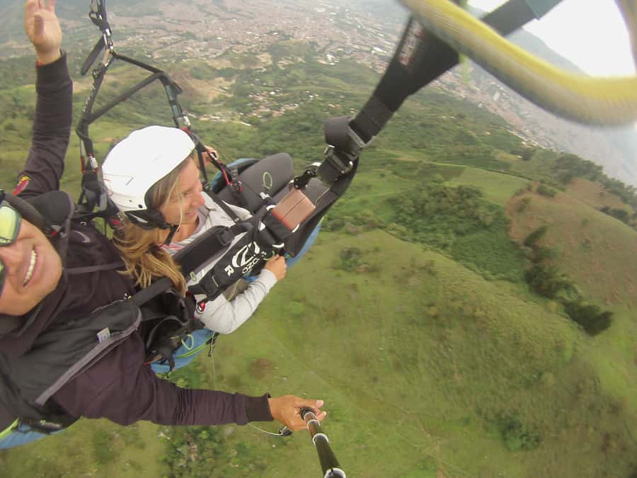 Paragliding Trip with Certified Pilots + Transportation - Taking off above Medellín