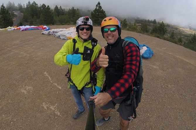 Premium Paragliding in Tenerife : Photos, videos and pickup included - Flying over Tenerife with Teide behind you