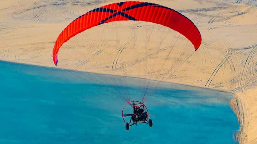 Qatar's Skybound Adventure: Exclusive Private Paratrike tour - Taking off above Al Wakrah Municipality
