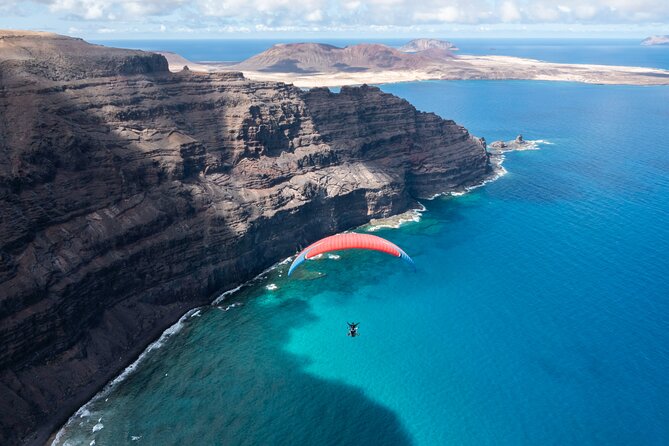 ROLLERCOASTER FLIGHT tandem paragliding Lanzarote with adrenalin - The view: ocean, lava, and volcanoes