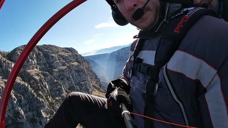 Tandem flight with paramotor from above ioannina zagori - Lake Pamvotis, boats, and Ioannina’s island