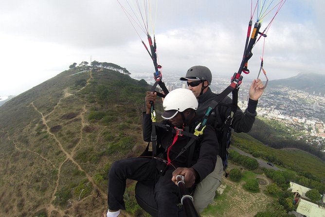 Tandem Paragliding Cape Town Experience TABLE MOUNTAIN PARAGLIDE - Landing beside the Atlantic