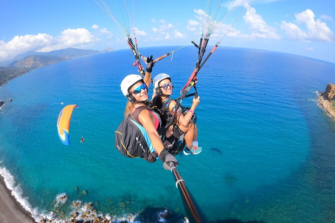 Tandem Paragliding Flight in Cefalù - GoPro Photos and Video Sent to Your Phone