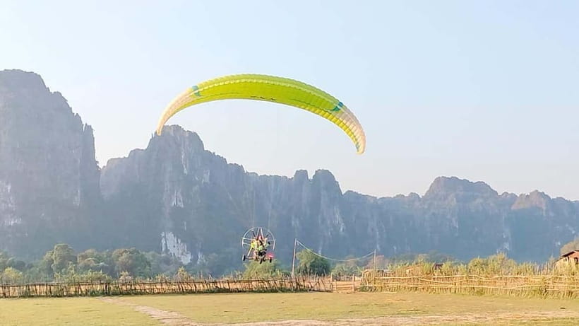 Vang Vieng: Paragliding Experience with Hotel Pickup - Key points at a glance