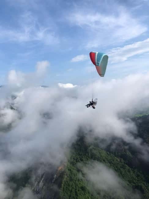 Vang Vieng: Paragliding Experience with Hotel Pickup - Choosing sunrise or sunset